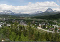 Coleman is seen in the distance, with Mt. Tecumseh and Crowsnest Mtn. framing the shot