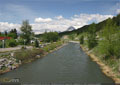 The Crowsnest River runs along Hwy 3 on the north side of Blairmore