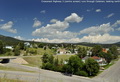 Crowsnest Highway 3 (centre Screen) runs through Coleman; looking north