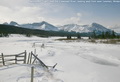 Sentry Mtn (right) over the Crowsnest River; looking west from west Coleman; Winter