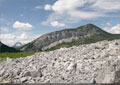 Crowsnest Mtn. and Bluff Mtn. behind the Frank Slide debris field (looking west)