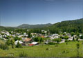 Trees and foothills surround Hillcrest in this view looking east
