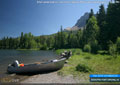 Small powerboat on the shore of Beaver Mines Lake; looking east to Table Mtn