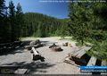 Forested hills to the south; looking over the group firepit at the shelter