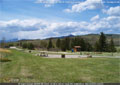 Looking west at the windmill from the upper loop at Lundbreck Falls 