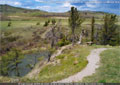 A sitting bench above the Crowsnest River downstream from Lundbreck 